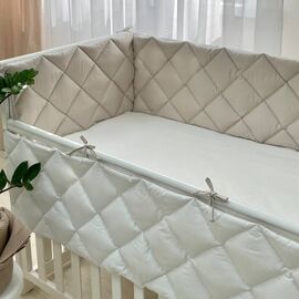 Babybettumrandung beige