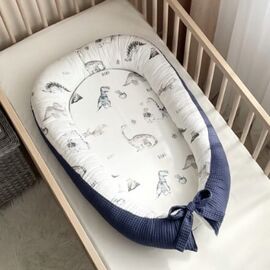Babynestchen Kokon 2-seitig DINO, blau, mit Matratze