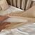 Beiges Neugeborenenset: BabyNest mit Matratze, Deckenwickel, Kissen, Foto 5