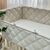 Babybettumrandung beige