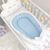Doppelseitiges Babynest hellblau/weiß mit Matratze (für Jungen), Foto 2